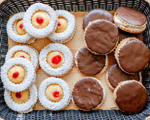 jam-filled, chocolate-covered cookies in a basket - mexican bread