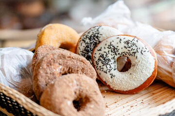 glazed doughnut covered with chocolate chips and more donuts - Mexican bread 