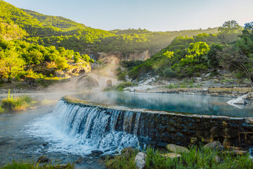 Stream of hot sulfuric water in the thermal baths of Permet Albania. Langarica Canyon, Kadiut Bridge