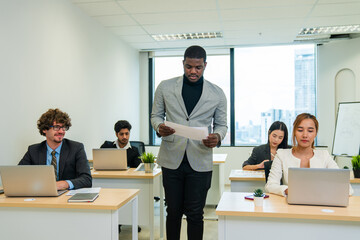 Leader or businessman sends documents male colleague in the creative office.