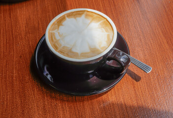 Hot latte in a warm atmosphere  