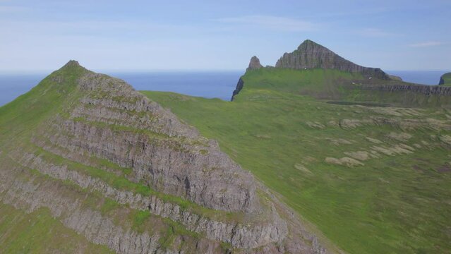 Drone flying above ridge in Hornstrandir wilderness in summer, Located in the arctic circle in Westfjords, Iceland.