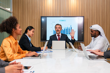 Group of professional business people are working and shaking hands while working in the creative office.