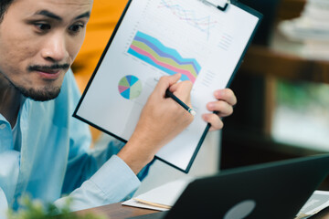 Smart positive smile asian male businessman video conference Meeting online via laptop, remote working discuss in conversation about strategy planing for new business marketing startup ideas concept