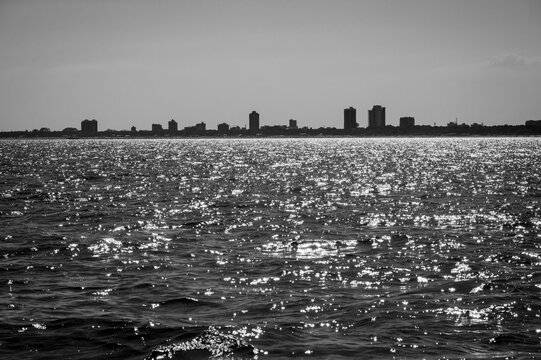 Between sea and lagoon. Sailing trip between the Marano lagoon and the Gulf of Trieste. Black and white.