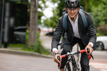 Manager commuting to the office by bike
