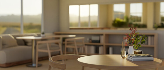 Copy space on a wooden round table in a modern and comfortable coffee shop or cafe.