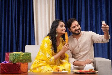 Young brother and sister celebrating Raksha Bandhan,Bhai Dooj