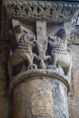 Carving detail (Crucifiction of Peter the Apostle) at the Abbey de la Sauve-Majeure in the Nouvelle-Aquitaine region of south-west France