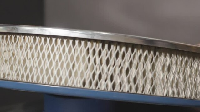 An air filter from the 60's spinning.