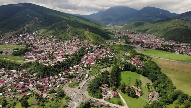 Aerial view of Garcini a neighborhood of Sacele, Brasov on partly sunny day