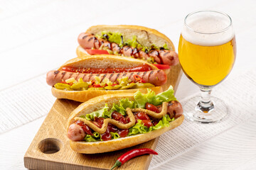 Various hot dog and beer