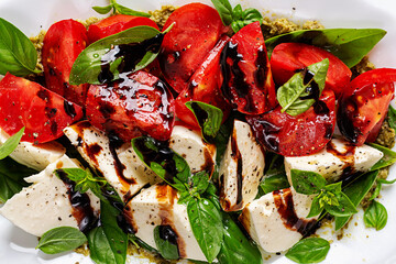Caprese salad tomato for concept design. Texture, background, close up. Food concept.