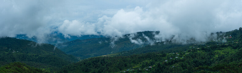 clouds floating over the mountain range,  Binsar road Kasardevi, Almora, Uttarakhand, rainy season, monsoon India