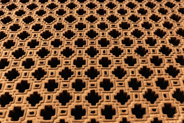 Orange concrete wall with pattern