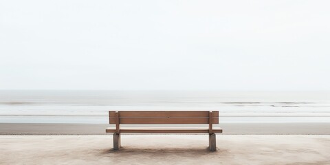 A bench alone with the sky in the background