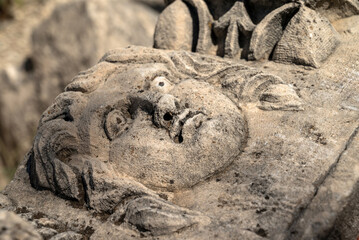 Stone Theater masks and Medusa relief in the Ancient City of Myra in Demre, Antalya