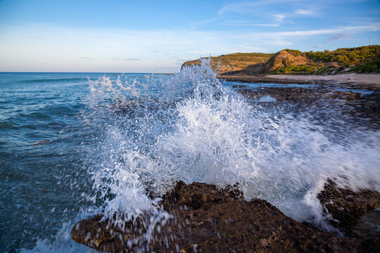 Waves Crashing On Rocks