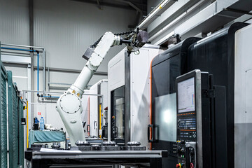 Robotic arm in metal industry with machines