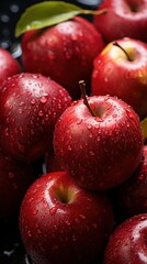 Fototapeta na wymiar Red apples with water drops closeup.food background .