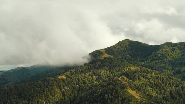 Clouds and mist over the Oquirrh Mountains in Utah - time lapse
