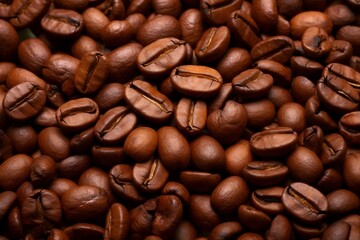 Coffee beans background. Close up view of roasted coffee beans