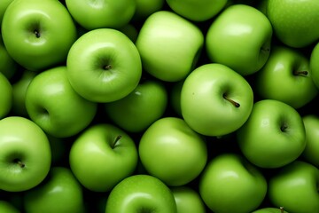 Green apples as background, top view