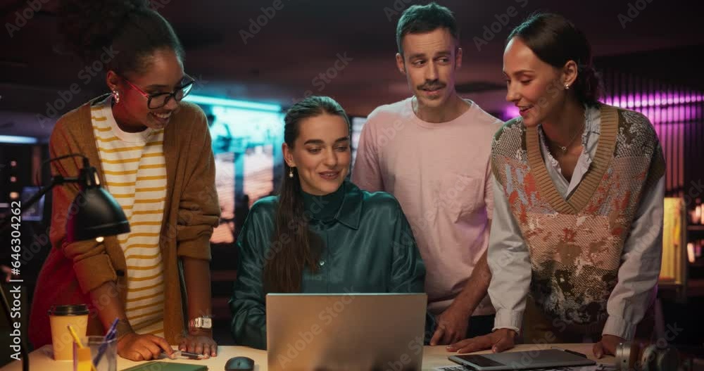 Poster Multiethnic Group of People Working on Developing Growth Ideas Based on Data Using Laptop Computer. Energetic Teammates Brainstorming For Marketing Strategy in a Creative Office at Night