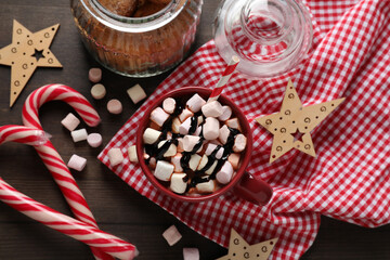 Concept of sweet drink, tasty cocoa drink with marshmallow, top view