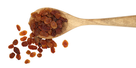 Pile raisins in wooden spoon isolated on white, top view 