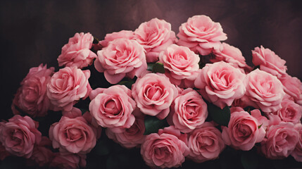 Beautiful bouquet of pink roses flowers on a dark background