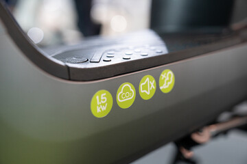 Close up of electric scooter with eco symbols