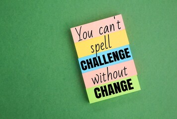colored paper arranged with the words You can't spell CHALLENGE without CHANGE. the concept of...