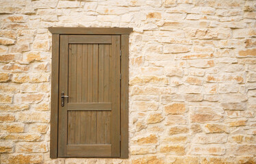 Fototapeta na wymiar Old brick wall and door texture background, copy space
