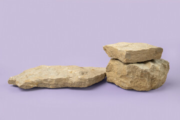 Stone podium for cosmetic, spa product presentation. Abstract minimal backdrop. Two rock form. Violet Studio Background. Scene to show. Showcase display case. 3D Front View. Trendy purple color. Space