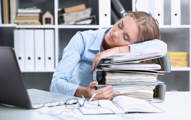 Lot of work wait for tired and exhausted woman. Huge pile of document folders headache and depression irs new problems emotion expression vacancy or holiday dream concept