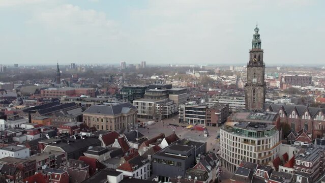 Martinikerk Bell Tower And Grote Markt Groningen In The City Center Of Groningen  In Netherlands. Aerial Drone Shot