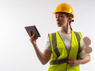 Woman design engineer. Builder with tablet computer. Architect in reflective vest. Engineer uses electronic gadget. Portrait builder in helmet. Design engineer on white. Building applications concept