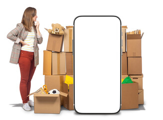 Woman with moving boxes. Phone mock up. Girl thinks about relocation. Big smartphone blank screen....