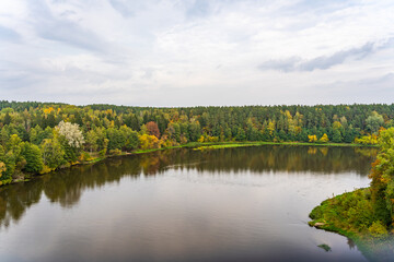 Aerial View of Neman or Nemunas River Surrounded by Autumn Forest in Druskininkai, Lithuania