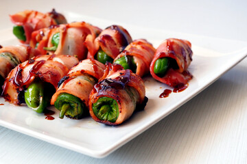 Padron pepper rolls wrapped in bacon