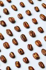 Obraz premium Coffee beans on white background - stock photo