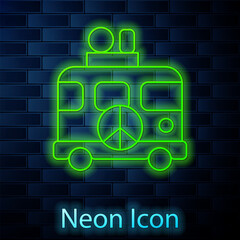 Glowing neon line Hippie camper van icon isolated on brick wall background. Travel by vintage bus. Tourism, summer holiday. Vector