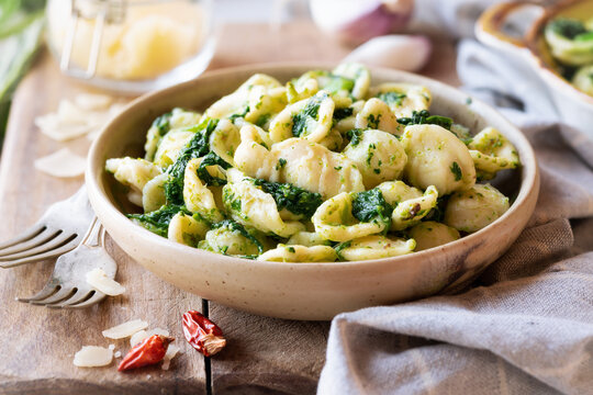Orecchiette con cime di rapa or friarielli - fresh pasta with turnip greens or broccoli rabe, typicl of Apulia region of Italy.