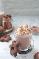 A glass mug with hot chocolate