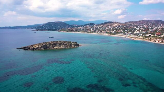Amazing turquoise water in the Agean coast of Attica Sunio filmed by drone.