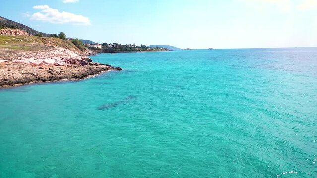 Amazing turquoise water in the Agean coast of Attica Sunio filmed by drone.