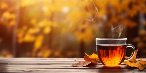 Fotobehang heiße Teetasse im Herbst © Jenny Sturm