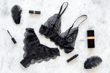 Beautiful womens lace underwear. Black lingerie set with accessories, top view