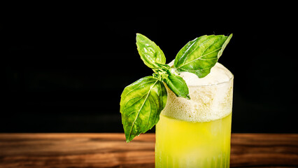 Mojito cocktail with mint leaf aorno on a black background